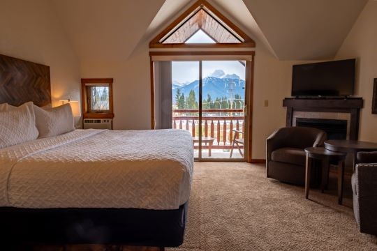 Cabin-inspired suite with mountain views