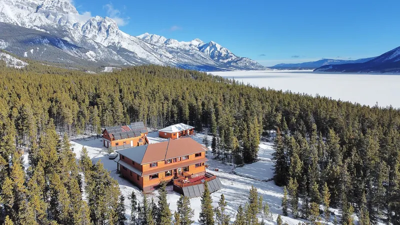 Aerial view of Aurum Lodge property and Abraham Lake