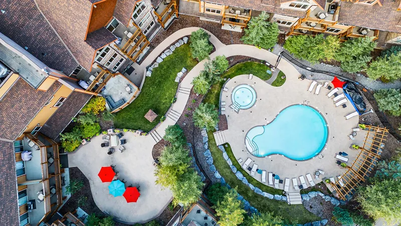 Heated outdoor pool and hot tub aerial view